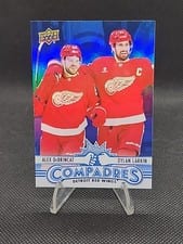 2025-26 Upper Deck Compadres Alex DeBrincat / Dylan Larkin #CM-1 card