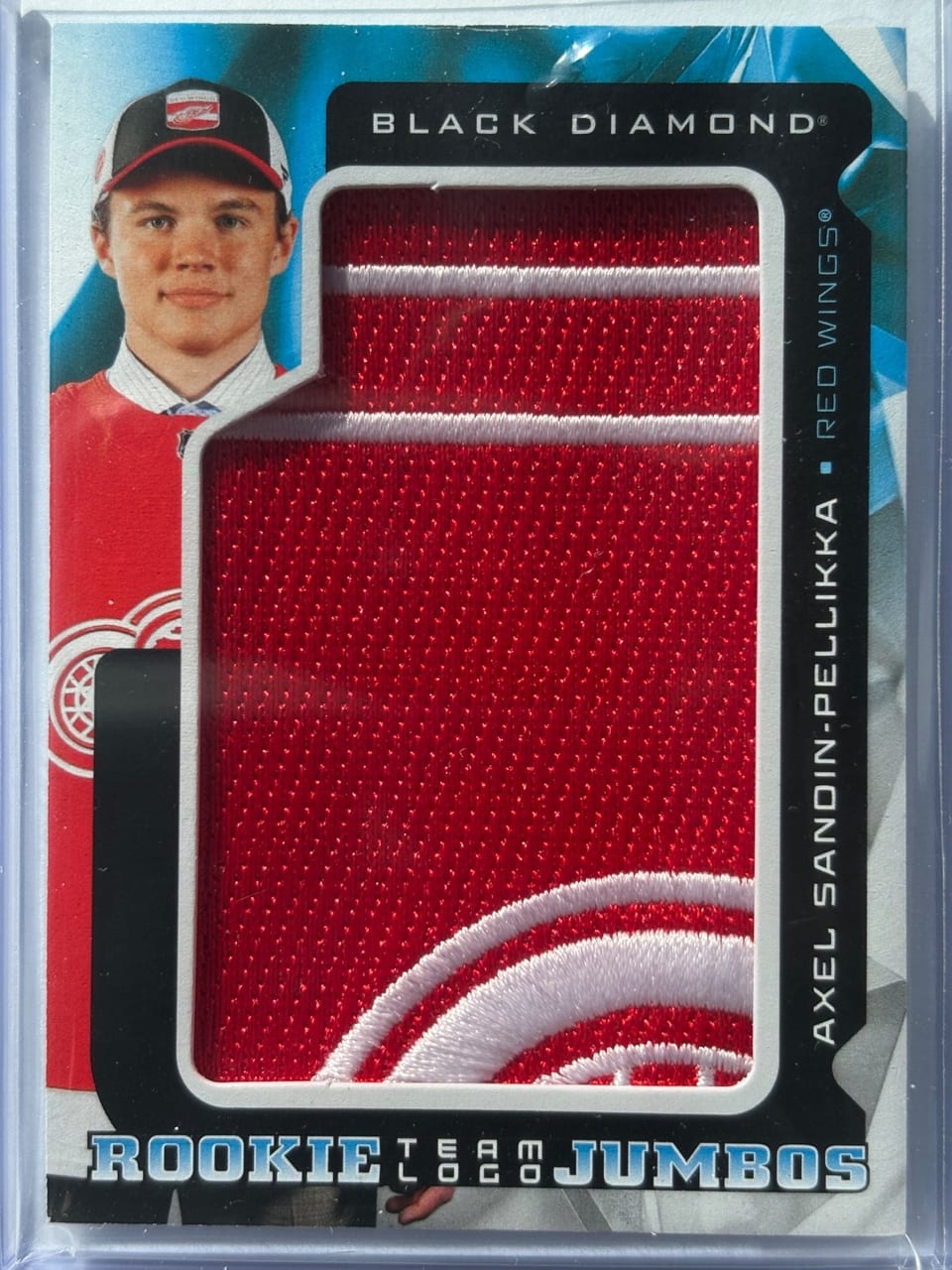 2025-26 Upper Deck Black Diamond Rookie Team Logo Jumbo Puzzle Patch Axel Sandin-Pellikka #RTL-AS card