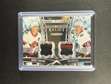 2022-23 Upper Deck Black Diamond Diamond Mine Dual Relics Brady Tkachuk/Tim Stutzle #DMDR-TS card