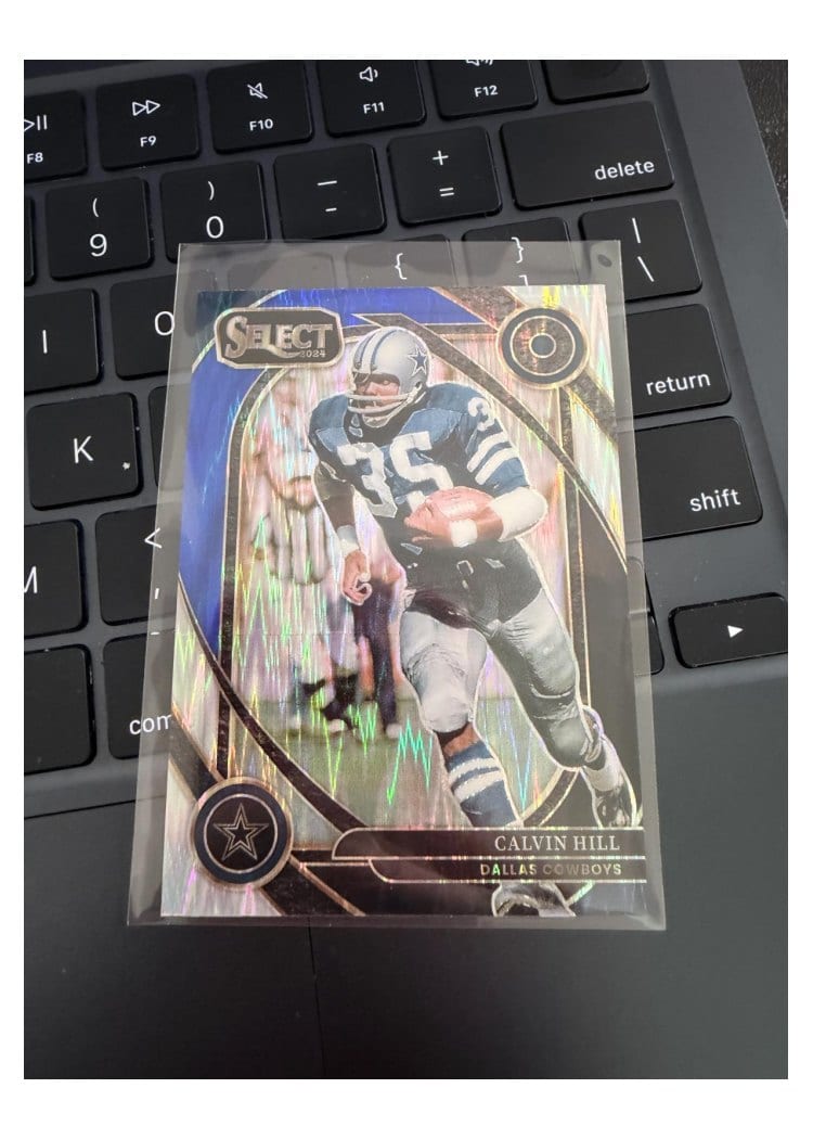 2024 Panini Select Base Set Calvin Hill Black Blue Prizm Shock #215 card