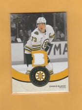 2023-24 Upper Deck Boston Bruins Centennial Centennial Cloth Relics Charlie McAvoy #CCR-CM card