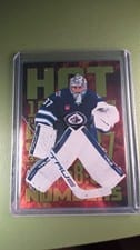 2025-26 Flair Hot Numbers Connor Hellebuyck #HN-23 card