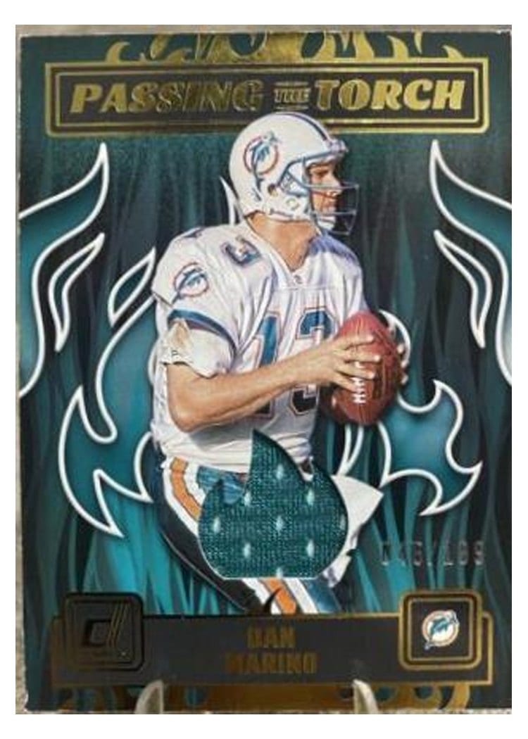 2023 Donruss Passing the Torch Jersey Relics Dan Marino / Tua Tagovailoa #PTT-4 card