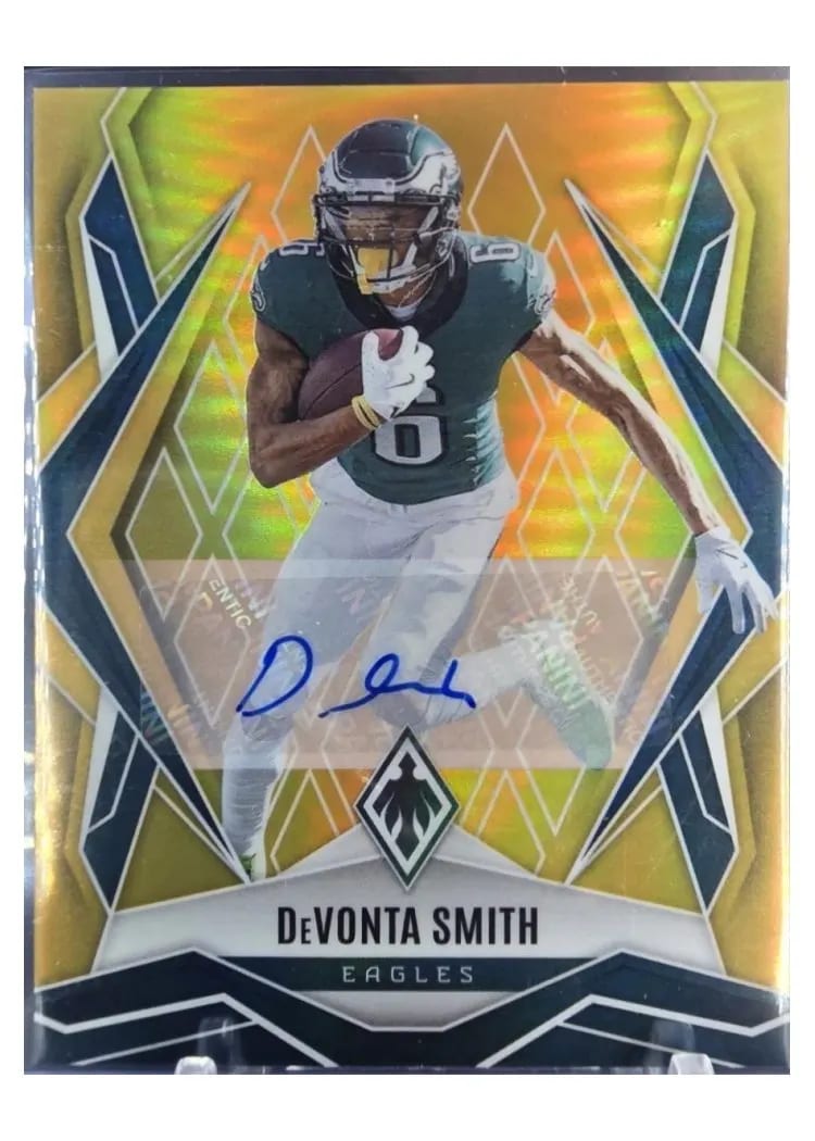2025 Panini Phoenix Base Set DeVonta Smith Gold Autograph #12 card