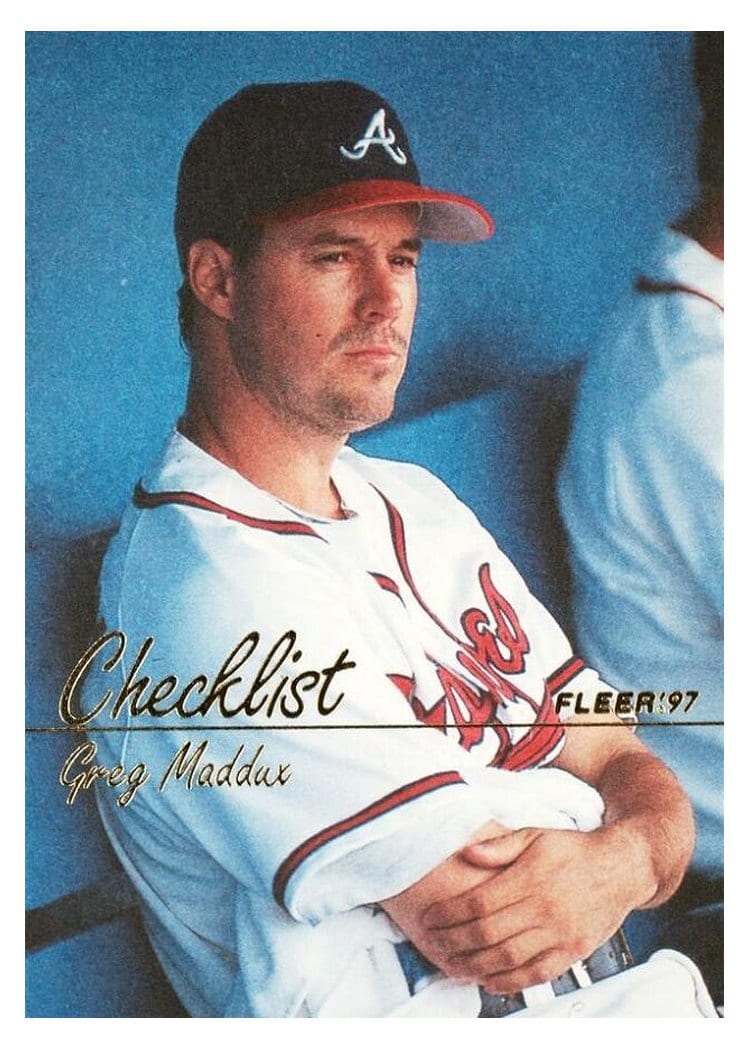 1997 Fleer Base Set Greg Maddux #722 card