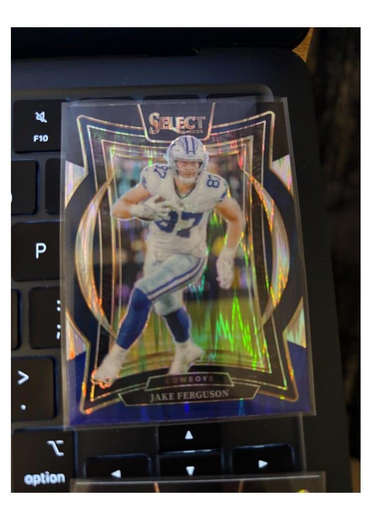 2024 Panini Select Base Set Jake Ferguson Black Blue Prizm Shock #64 card