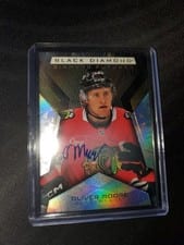 2025-26 Upper Deck Black Diamond Diamond Futures Oliver Moore #BDF-OM card