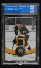 2023-24 Upper Deck Boston Bruins Centennial Centennial Cloth Relics Taylor Hall #CCR-TH card