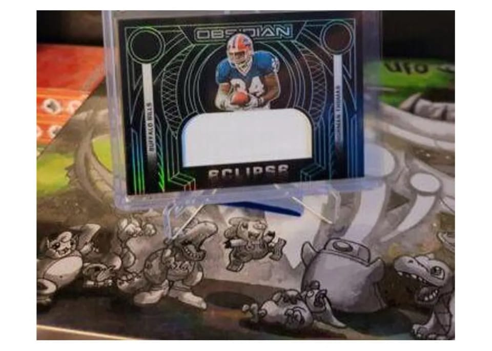 2022 Panini Obsidian Eclipse Thurman Thomas #ECL-TTH card