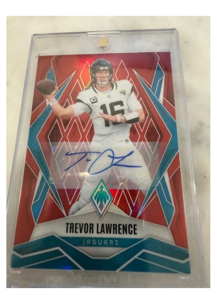 2025 Panini Phoenix Base Set Trevor Lawrence Red Autograph #15 card