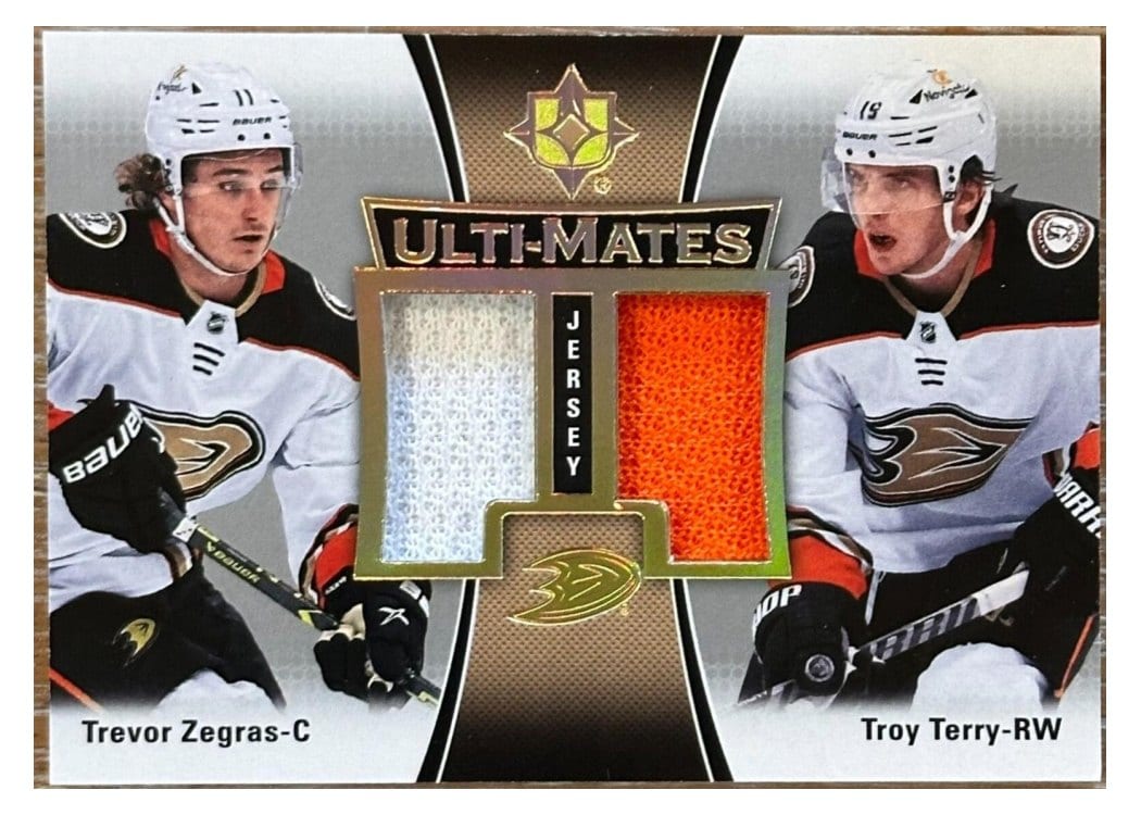 2022-23 Upper Deck Ultimate Collection Ulti-Mates Jersey Trevor Zegras/Troy Terry #UTM-TZ card