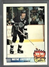 1990 Topps Team Scoring Leaders Wayne Gretzky #12 card